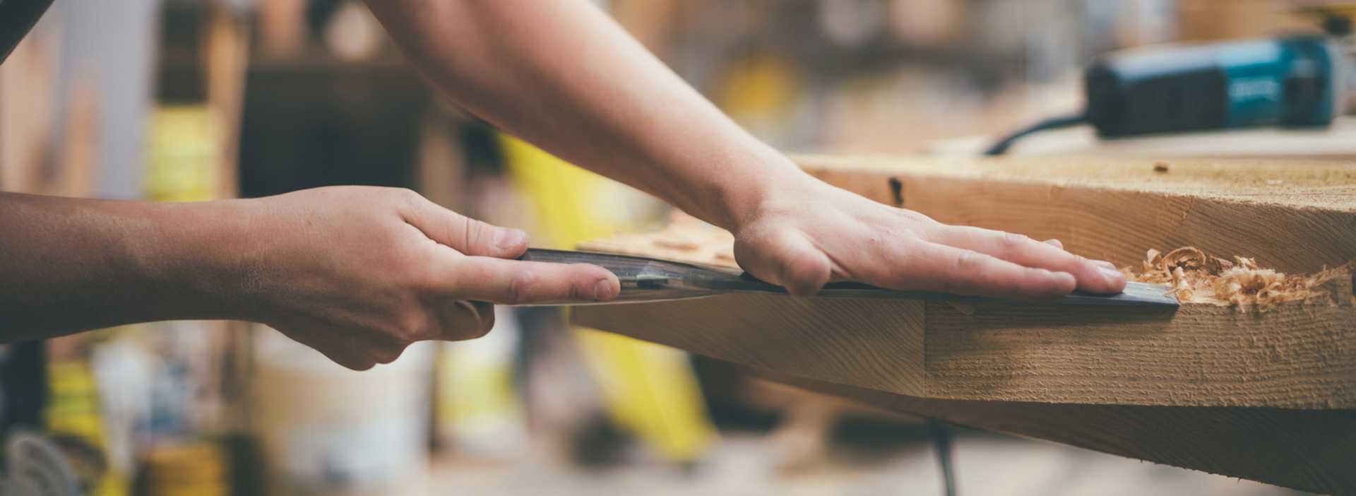 Cloud 9 carpenter planing wood